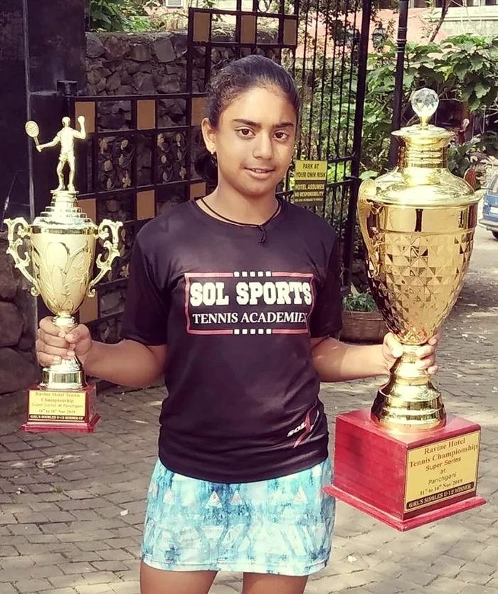 Sol Sports player with trophy