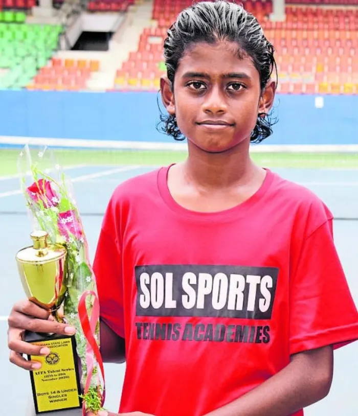 Sol Sports player with trophy