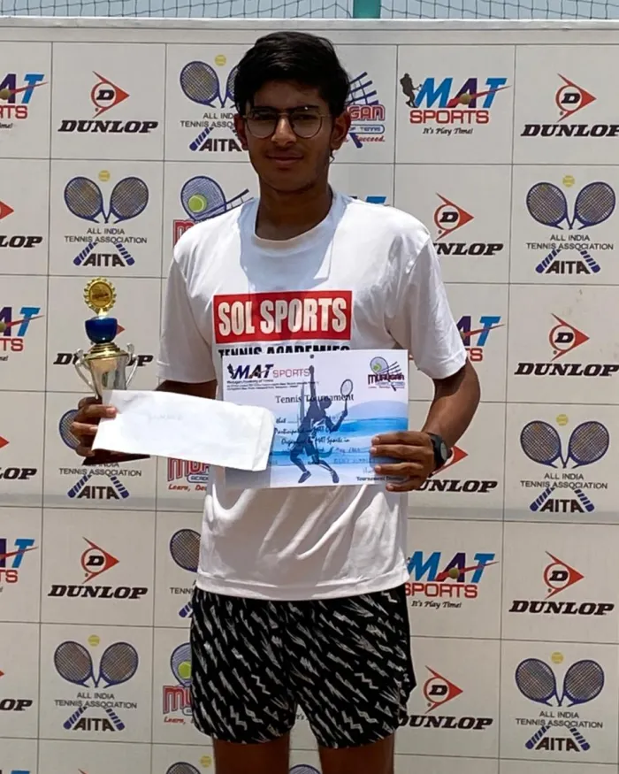 Sol Sports player with trophy
