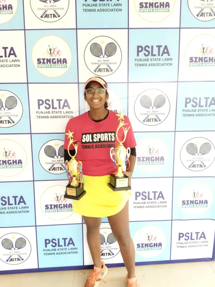 Sol Sports player with trophy